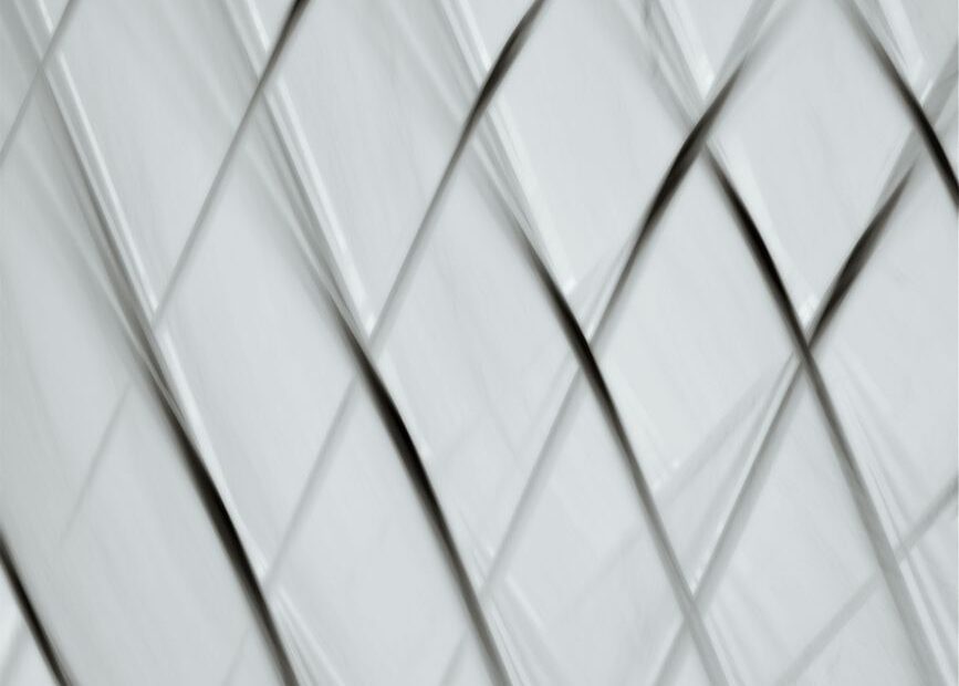 a white and black abstract pattern with lines